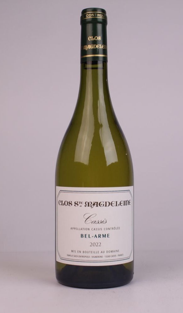 Bottle of Clos Sainte Magdeleine Bel Arme Cassis blanc, an old-vine white wine grown on seaside limestone terraces beneath Cap Canaille.